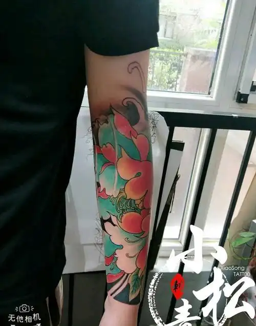 包小臂牡丹花纹身图片_手臂新传统纹身图案