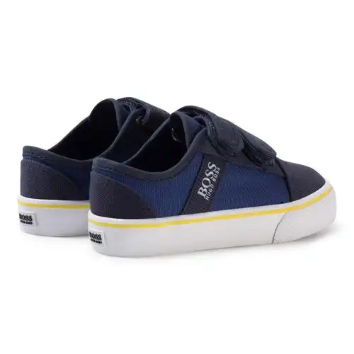 navy and blue velcro branded trainers