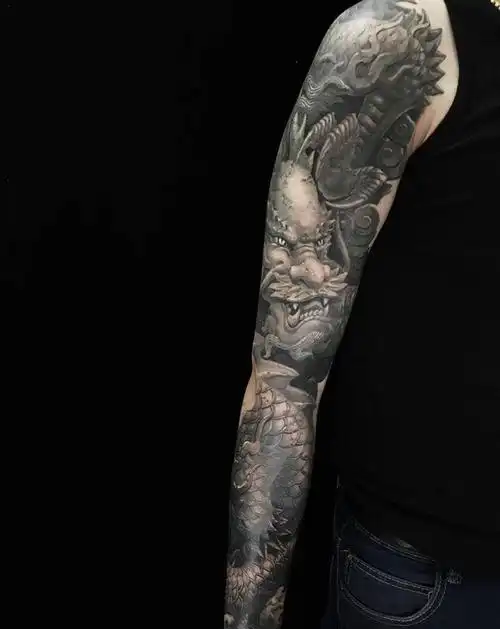 《青龙臂》石雕纹身纹身图片_手臂雕王石雕纹身图案