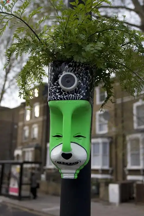 废饮料瓶,油桶制作花盆作品欣赏(图文教程)