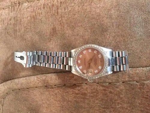 劳力士 8385 750 18k 看看是不是真的,价格多少?