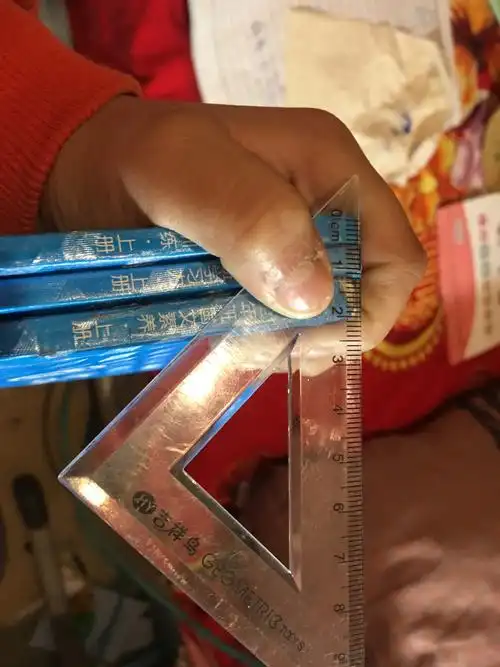 三本书是二厘米,一亿本书是多少厘米?