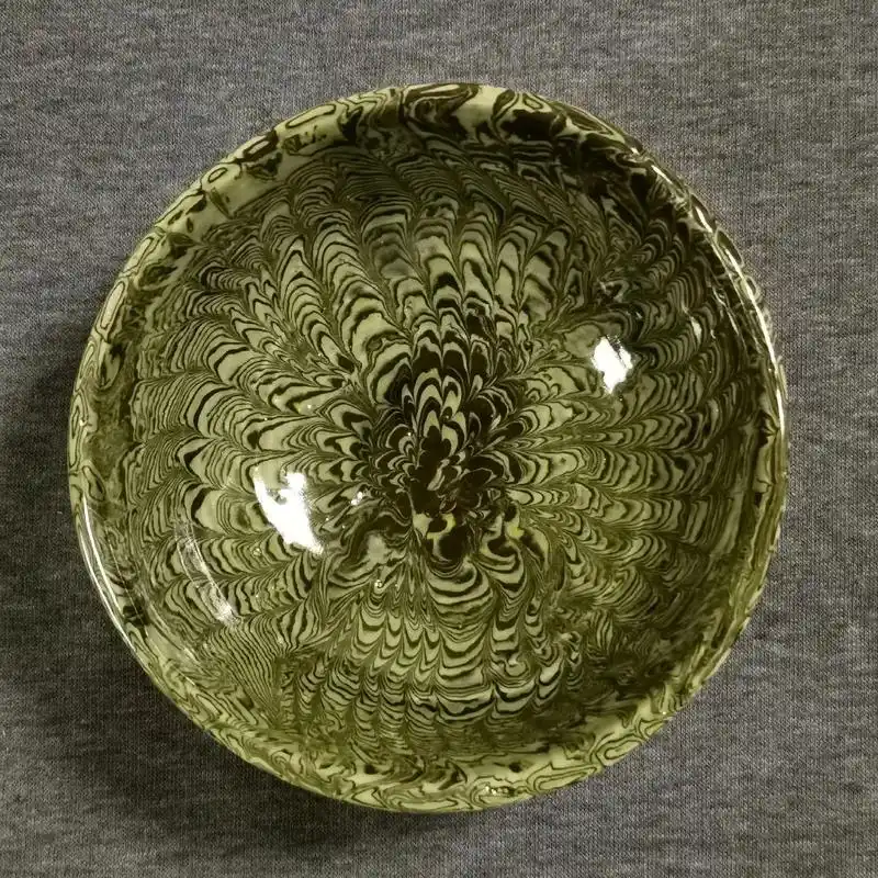 绞胎瓷创烧于唐,盛于宋.其胎体纹理内外通 - 抖音