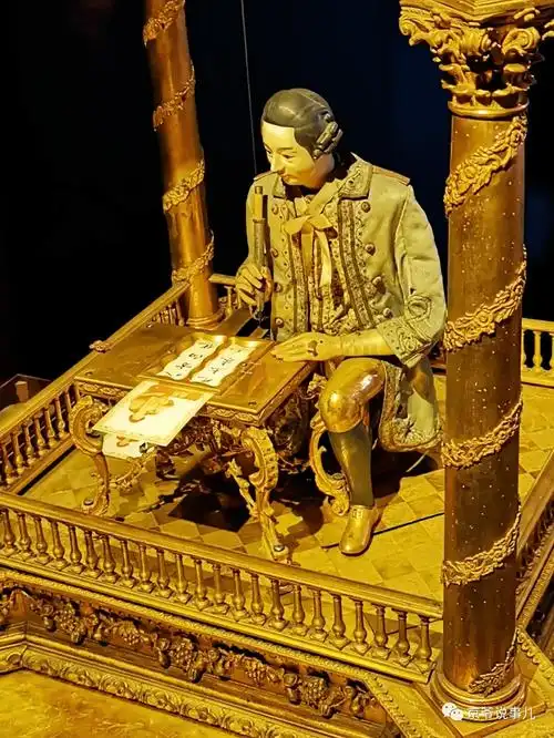 乾隆爷最心爱的钟表——铜镀金写字人钟,竟然会写毛笔字儿_贡入_西洋