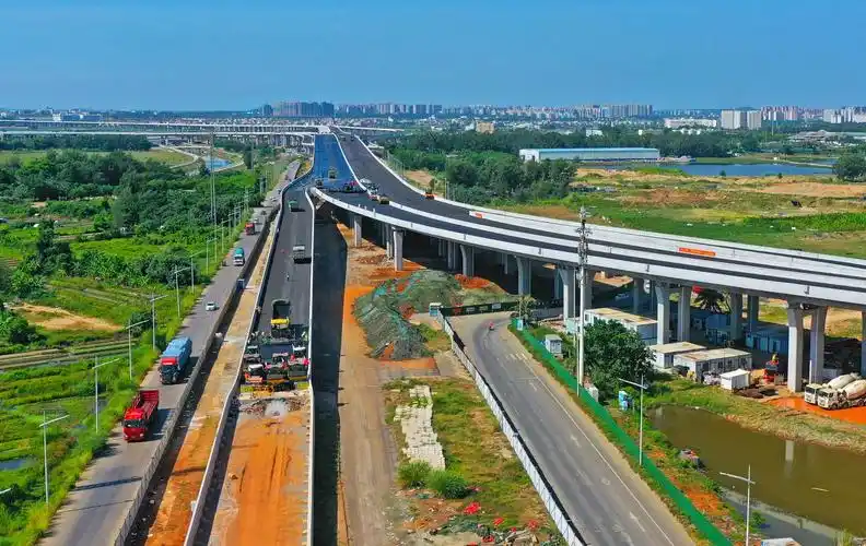 原创组图g15沈海高速海口段开始铺设沥青将于今年年底建成通车