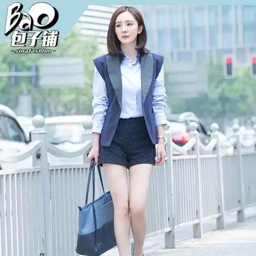 杨幂在《翻译官》中拿tumi手袋