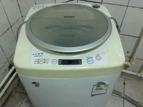 因搬家装让电视机长虹100,饮水机美的的只有加热40,洗衣机海尔小神童