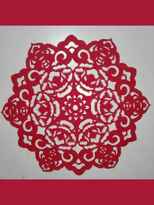 牡丹寓意富贵,如意表示吉祥.该剪纸作品传达了一种美好的祝愿和祝福.