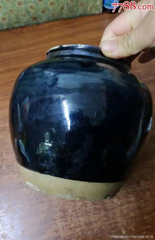 明代黑釉小罐高17口径10底足直经11
