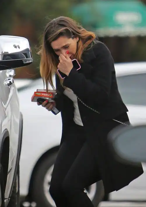 kelly brook – sneezes as she leaves rite aid pharmacy in
