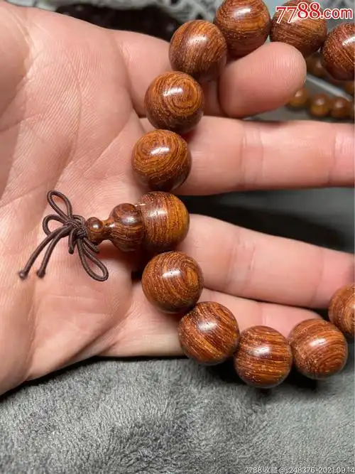 缅甸花梨文玩手串颗颗带鬼脸