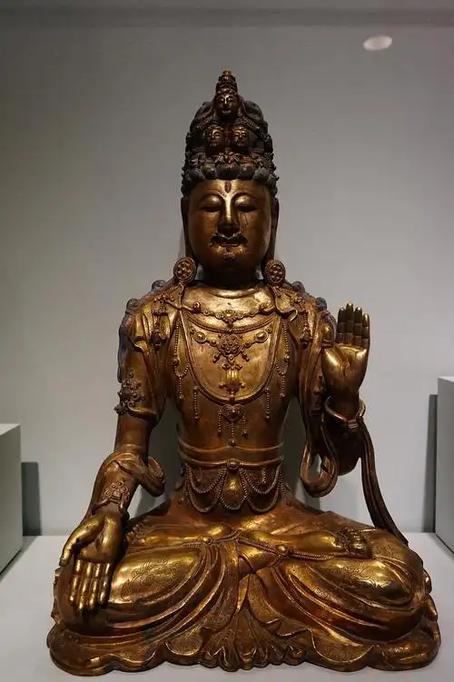 铜镀金四面观音坐像明