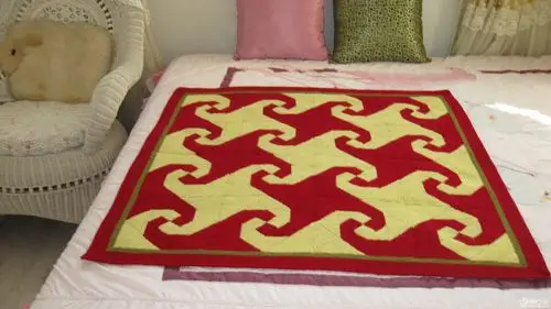 旧线编织的拼布风格棒针小毯子