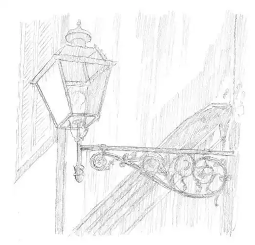 素描画一盏路灯照亮夜晚的路