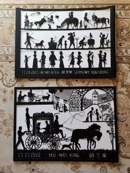 "一分钟剪出人像,他在德国展锋芒_胡卫星_剪纸_剪影