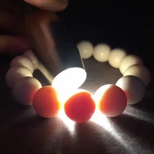 文玩珠宝收藏送礼品猛犸象牙打灯图