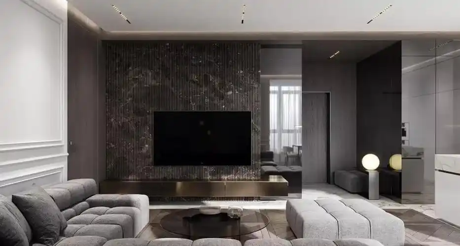 客厅被分成了两个颜色 一边白,一边暗 电视背景墙利用简单的线条装饰