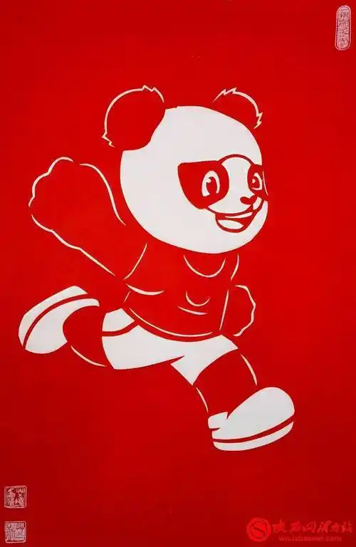 非遗传承人艾晓巧手剪纸展十四运风貌组图