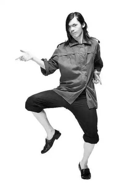 煤球哥李新义上节目 背后也有一个煤球嫂(图)