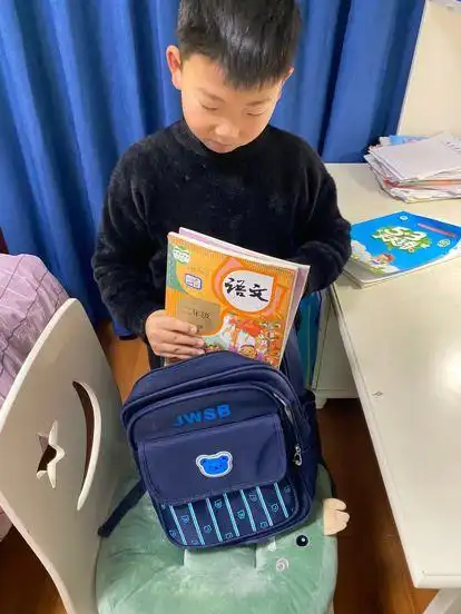 古山小学德育微课堂——学会整理_书包