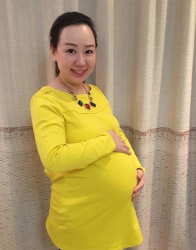 关凌晒孕照肚大如箩不堪重负想卸货