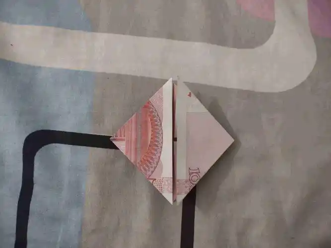 用100块钱折一个爱心怎么折100元折爱心的步骤流程附图解