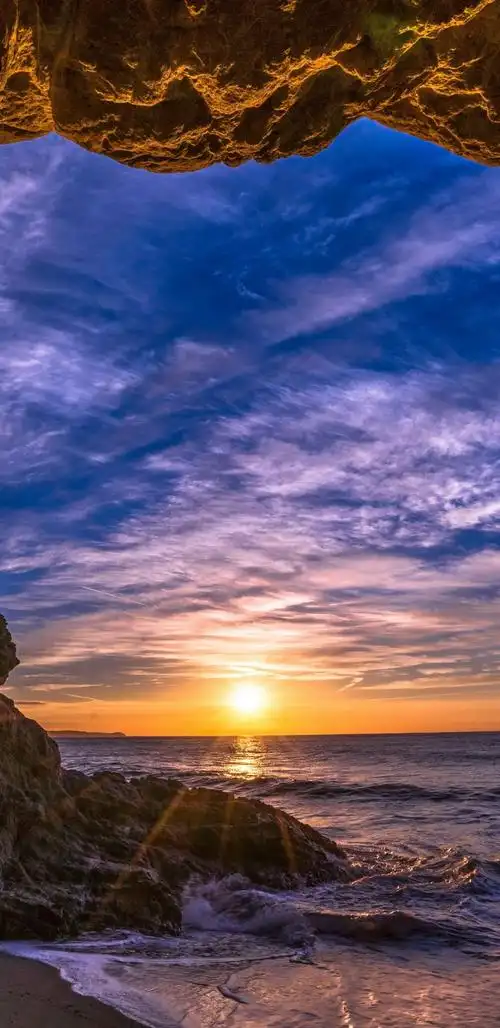 海边礁石夕阳大海风景