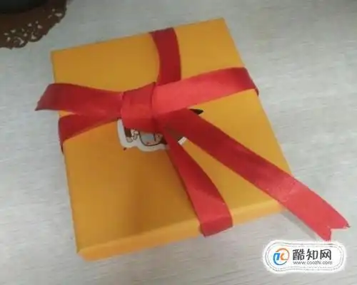 怎样包装礼物之3,基本的十字架形丝带系法优质